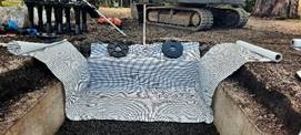 A picture containing ground, stone, cement, concrete

Description automatically generated
