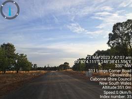 A road with trees on the side

Description automatically generated with medium confidence