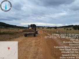 A tractor on a dirt road

Description automatically generated with low confidence