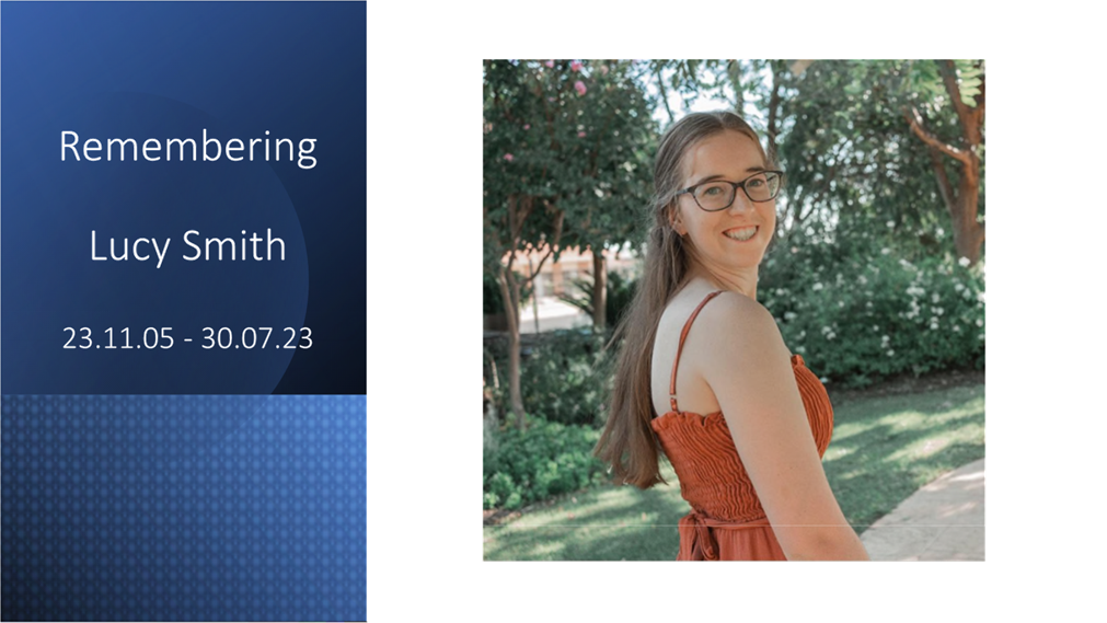 A person smiling at camera

Description automatically generated