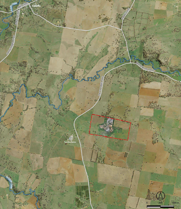 A map of land with a red square

Description automatically generated