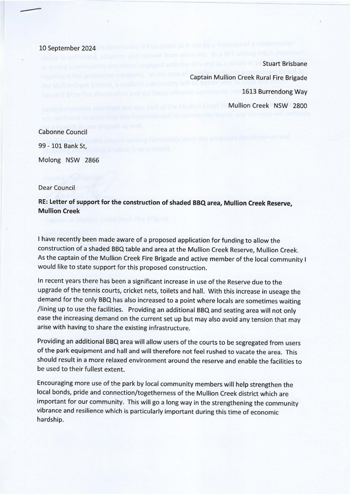 A close-up of a letter

Description automatically generated