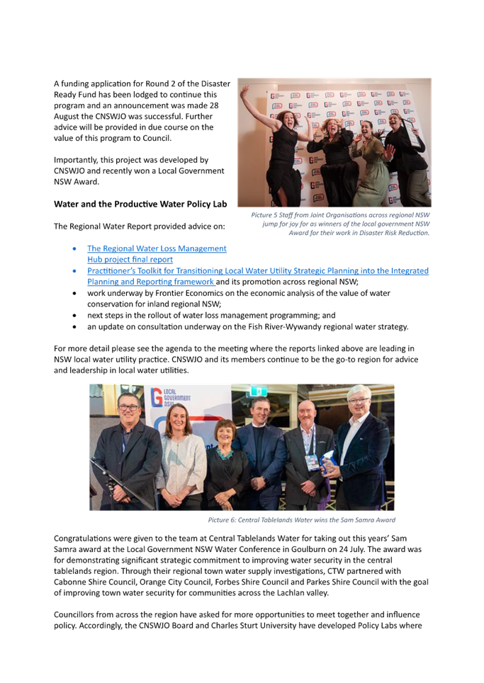 A group of people posing for a photo

Description automatically generated