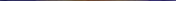 A medal on a blue velvet surface

Description automatically generated